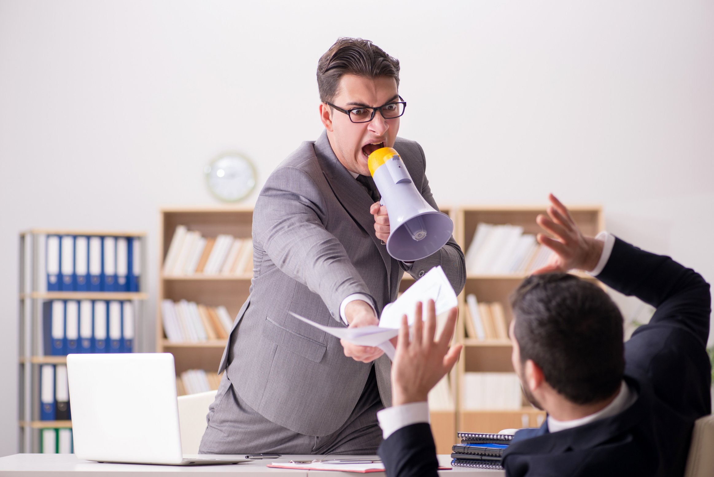 Angry Boss Shouting at His Employee